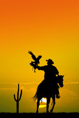 man on horse with hawk