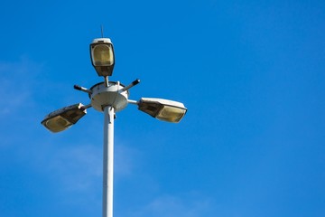 Street lamp on blue sky background