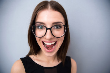 Closeup portrait of a young woman shouting