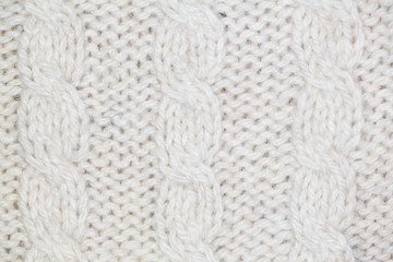 Knitting pattern from gray woolen warm soft yarn for background