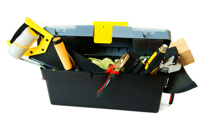 Many working tools in the box on white background.