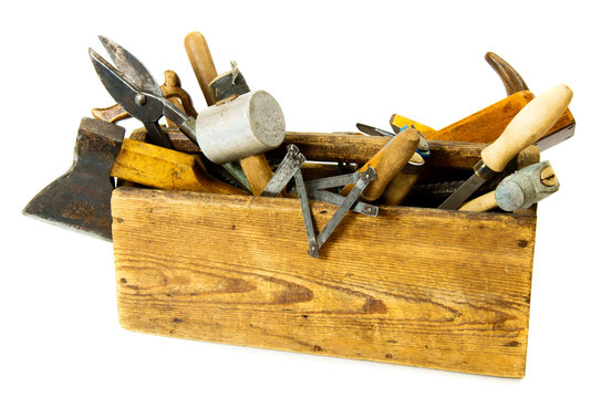 Working tools (drill, scissors and others) in an old box on
