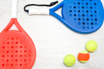 paddle tennis racket and ball