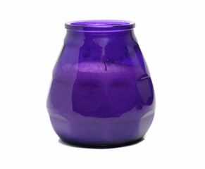 interesting purple candle in a vase