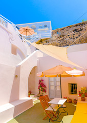 colored house in Fira the capital of Santorini island in Greece
