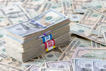 Bundled dollar banknotes, different denominations