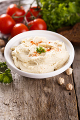 Hummus with vegetables and herbs