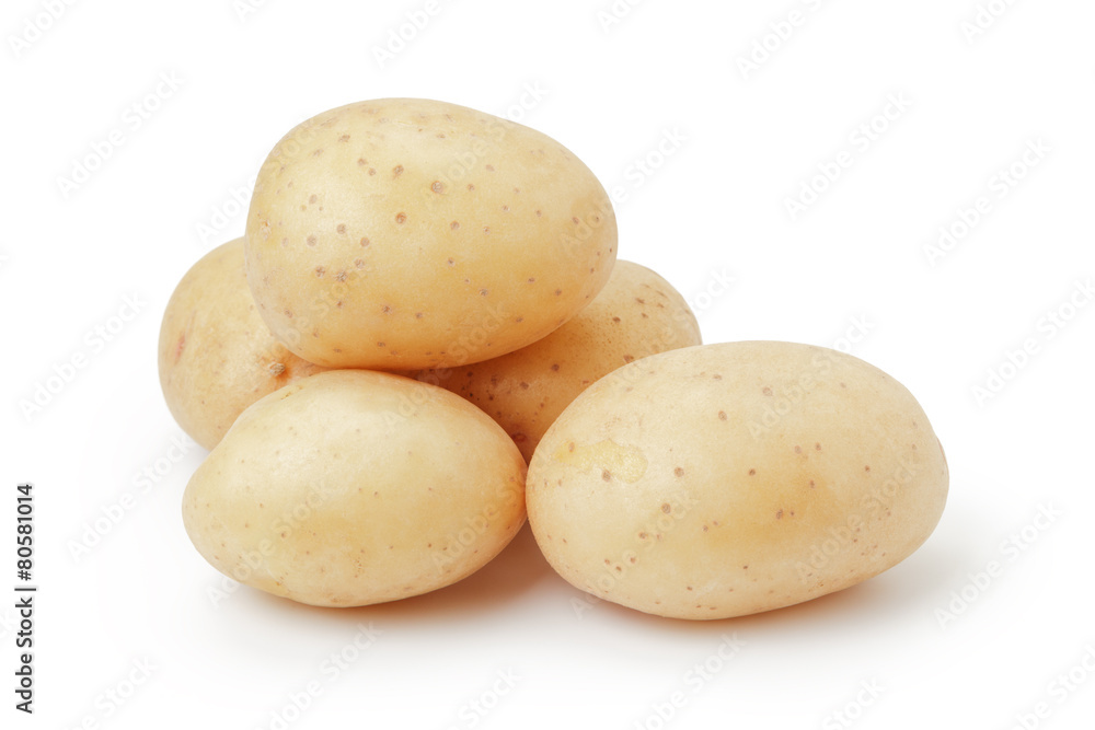 Wall mural heap of baby potatoes isolated on white