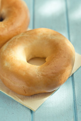 tasty bagels on kitchen table