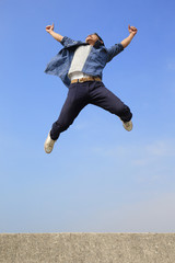 Happy man run and jump