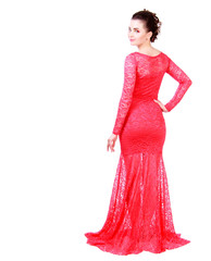 Beautiful young woman in a red evening dress