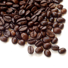 Brown coffee beans isolated on white background