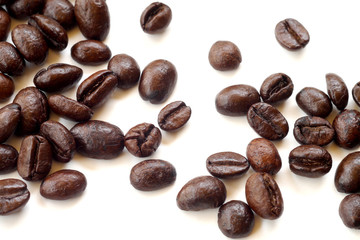 Brown coffee beans isolated on white background