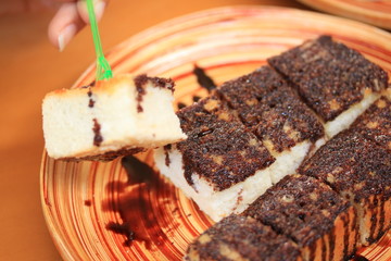 Toast bread topped with chocolate and butter.
