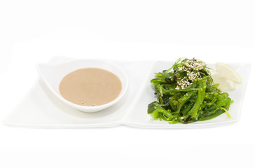 salad with exotic marine algae on a white background