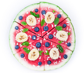 Watermelon pizza on white