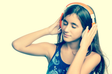 Instagram toned image of a teenage girl listening to music