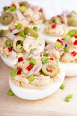 stuffed eggs with tuna, olives and paprica