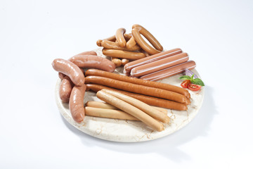 many type of sausage on marble plate and  white backgroun