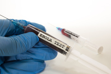 Fototapeta premium doctor with syringe with blood infected