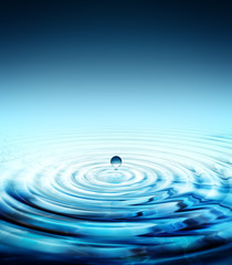 pure water drop splashing in water rippled