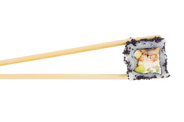 Sushi roll with chopsticks isolated on white