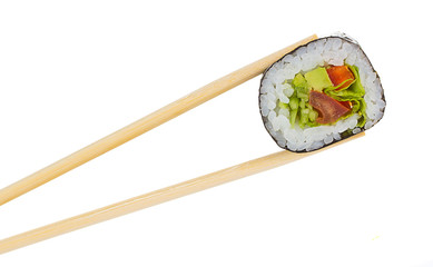 Sushi roll with chopsticks isolated on white