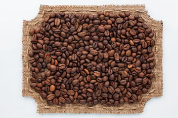 Figured frame made of burlap and coffee beans