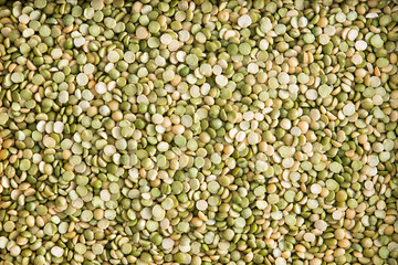 Background texture of dried green lentils