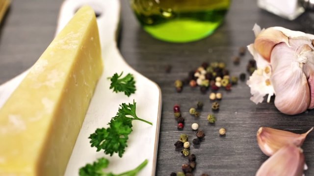 Cooking organic pasta with garlic herbs and parmesan cheese.