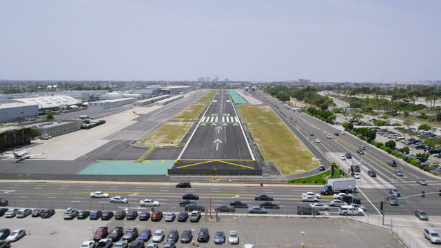 Aerial first person view, POV of plane landing on runway