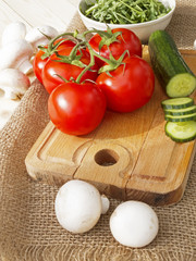 cucumbers, tomatoes, mushrooms and arugula