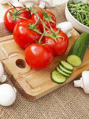 cucumbers, tomatoes, mushrooms and arugula
