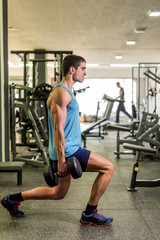 Young man trining at gym