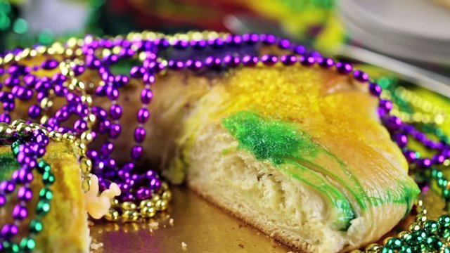 Table decorated for Mardi Gras party.