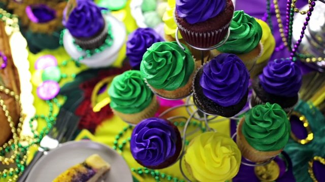 Table decorated for Mardi Gras party.