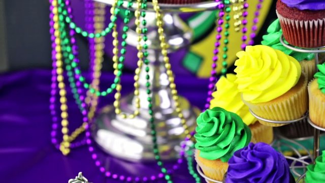 Table decorated for Mardi Gras party.