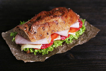 Fresh and tasty sandwich with ham and vegetables