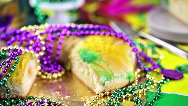 Table decorated for Mardi Gras party.