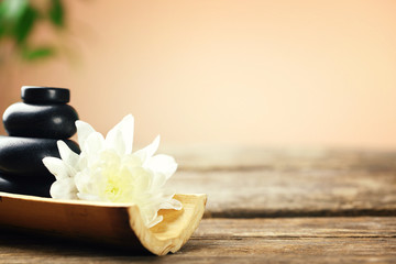 Beautiful spa composition on wooden table, on brown background