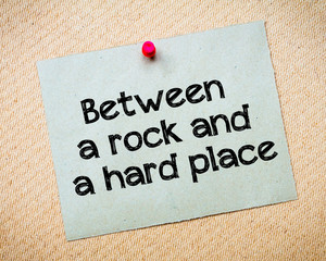 Between a rock and a hard place