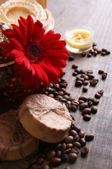 Composition of spa treatment, flowers and coffee beans