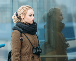 Young hipster woman photographer outdoors © sergeyzapotylok