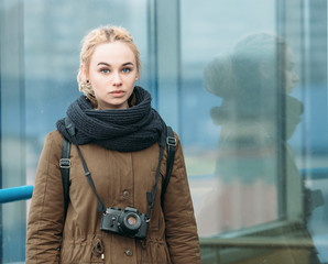 Young hipster woman photographer outdoors © sergeyzapotylok