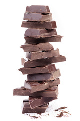 Stack of dark chocolate, isolated on white background