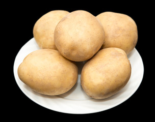 potatoes on a black background