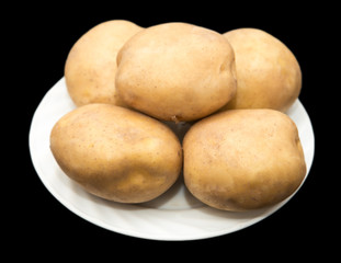 potatoes on a black background