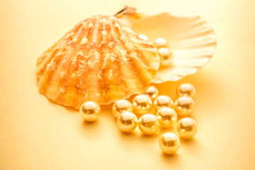 Scattering white pearls in seashell