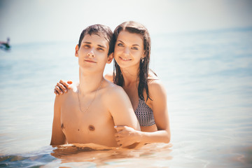 Fototapeta premium young beautiful girl embrace his boyfriend