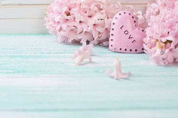 Background with fresh flowers hyacinths  and decorative heart